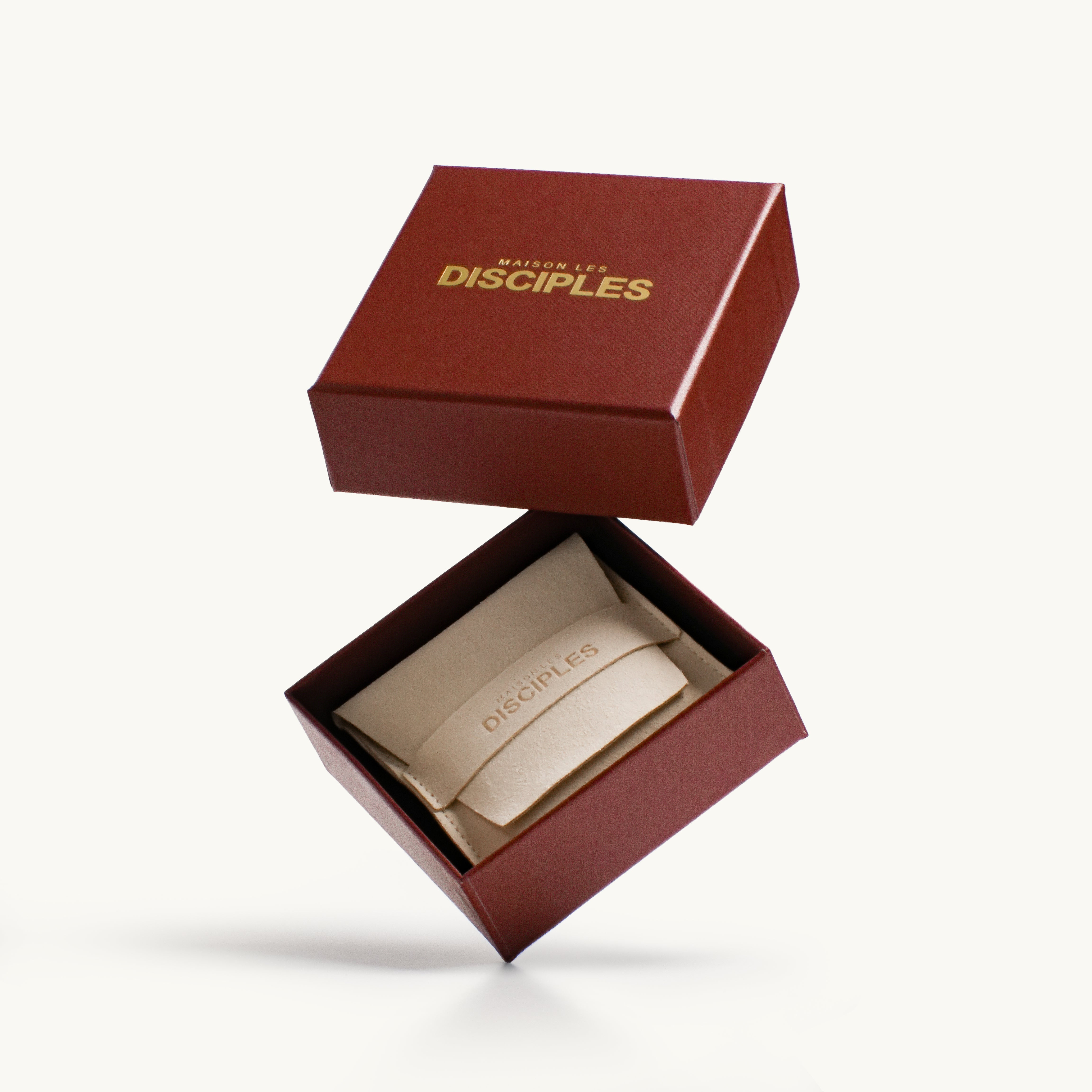 Maison Les Disciples product in a red box on a white background